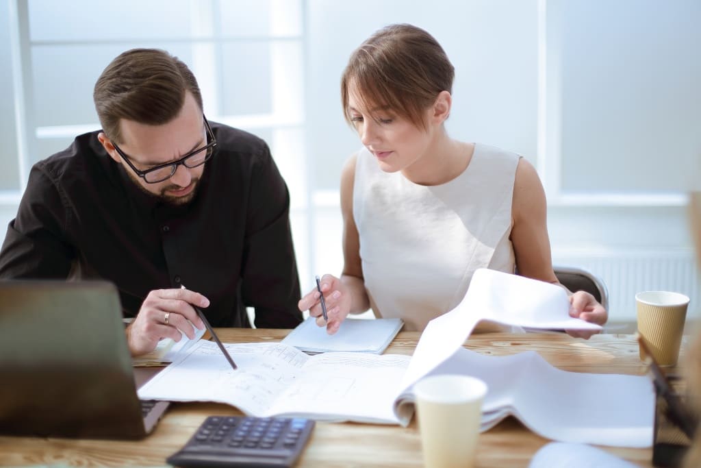 Lawyer Discussing With Her Client